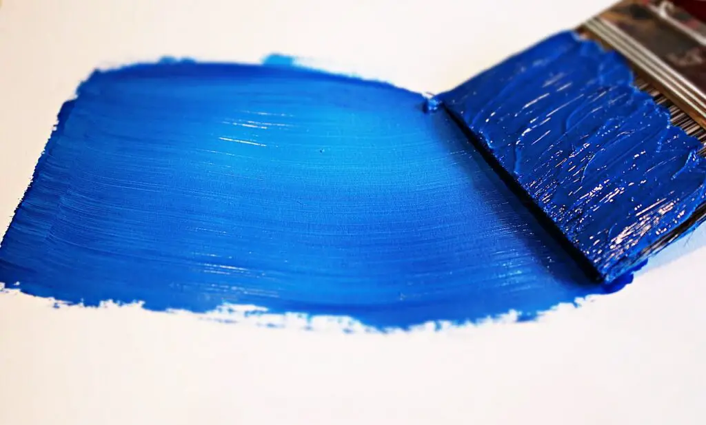 Aqua color on a paint brush.