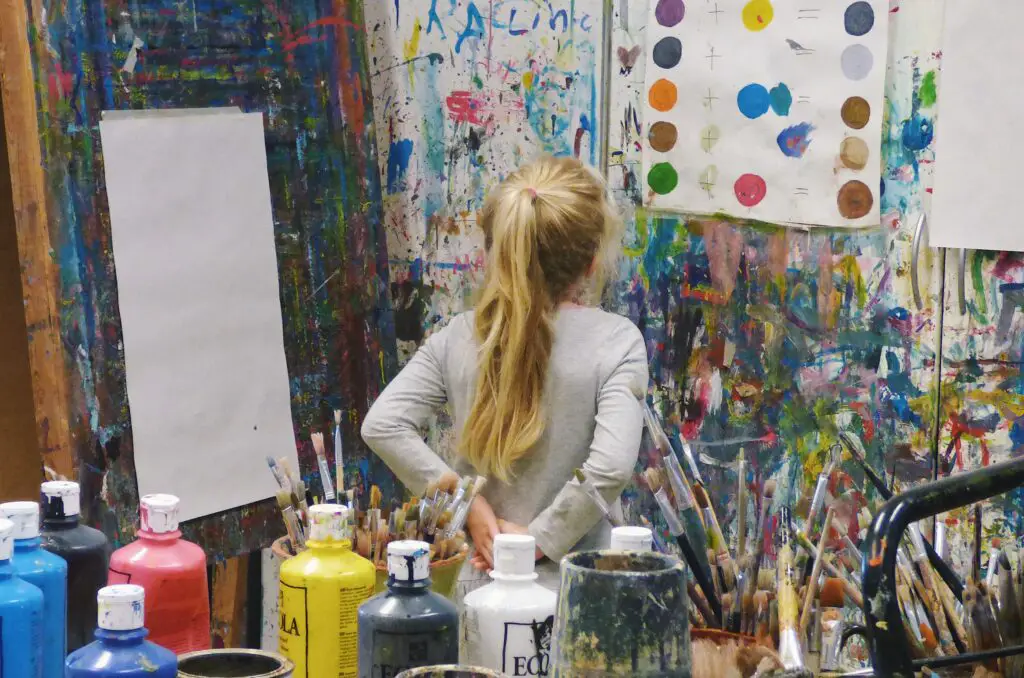 Artist's studio filled with art supplies